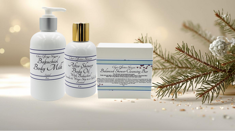 Bath and body products including a bottle of body milk, body oil, and a shower bar  on a decorative background with Christmas elements.