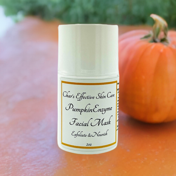 Pumpkin Enzyme Facial Mask/ with Pumpkin Enzymes, Fruit Enzymes and 1% Glycolic Acid/ White airless bottle with white cap surrounded by an orange and green background and a pumpkin/ Exfoliates skin/Char's Effectives Skincare