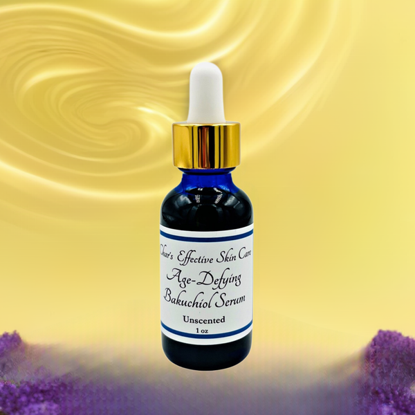 Age Defying Bakuchiol Serum for normal to dry skin / with L22, Vitamin C, CoQ10, Buriti Oil/ Scented Option/ 1 oz blue glass bottle with gold and white top dropper with swirling gold background and purple flowers in the foreground/Char's Effective Skin Care